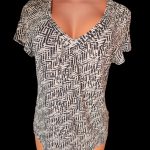 George /polyester short sleeve top,wide neck ,elastic  below ,ruffle arm & black design